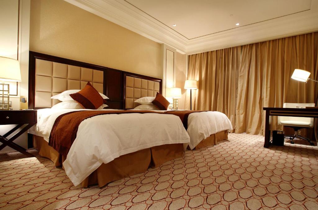 Landison Green Town Hotel Xinchang Zimmer foto
