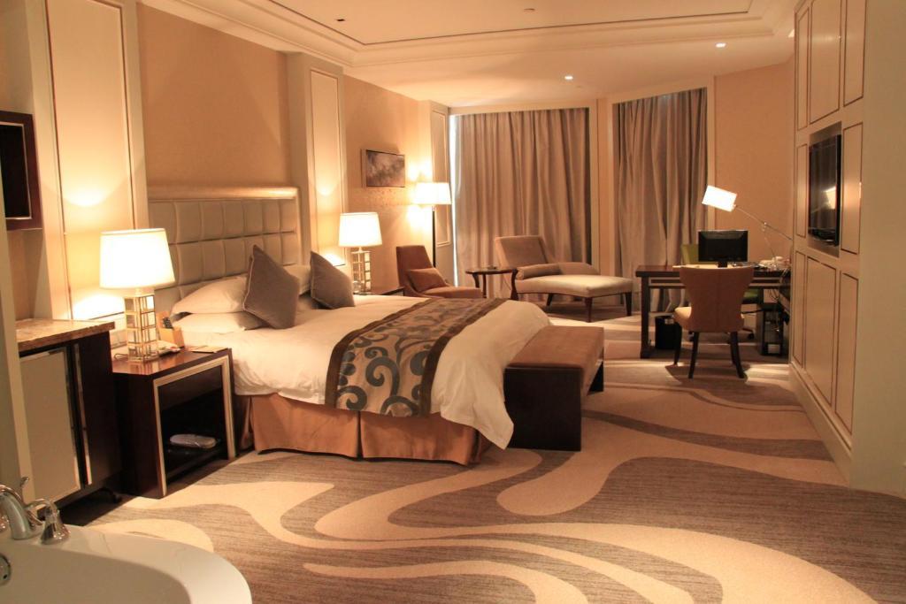 Landison Green Town Hotel Xinchang Zimmer foto